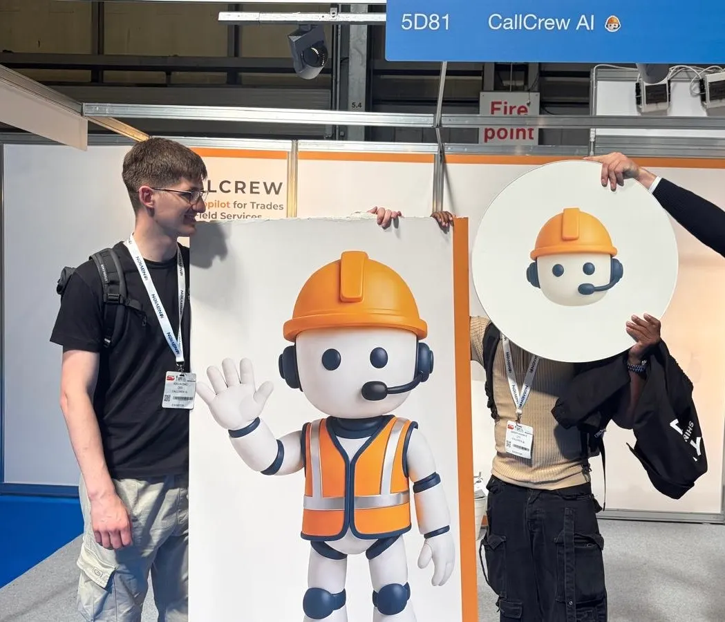 Holding up the CallCrew mascot at stand 5D81